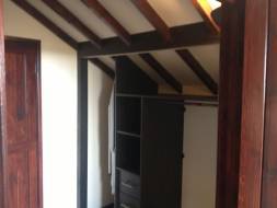 another interior fitted into the eaves of a room providing a function use of the space