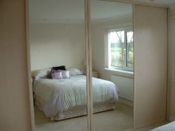 Plain mirror and panel pearwood doors