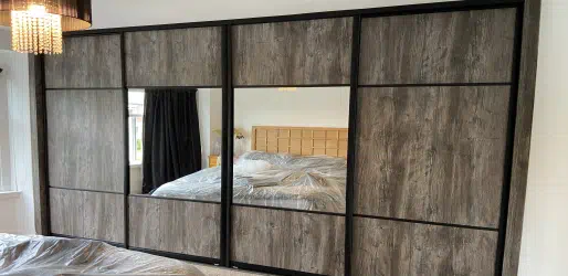 Split panel fitted wardrobes.
