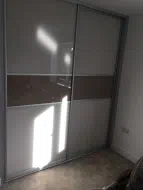 White and light brown glass sliding doors, installed in Stockton-on-Tees
