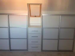 Satin silver frames with satin white glass and white panels (straight on view), fitted in Teesside