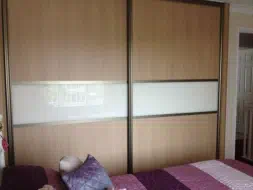 Pure white glass dividing strip in a oak panel door, fitted in Acklam