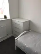 Custom made drawers to fit the opening between the bed and the wall in Darlington