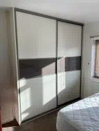 Woodgrain white panels with a glass strip splitting the doors, fitted in Redcar